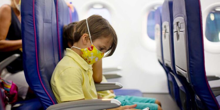 How to Travel Safely on a Plane With Kids This Summer