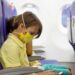 How to Travel Safely on a Plane With Kids This Summer